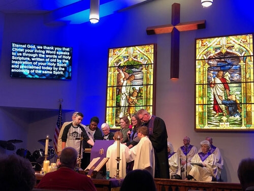 Area Bishop, Sandra Steiner Ball and congregation members dedicate the pulpit.